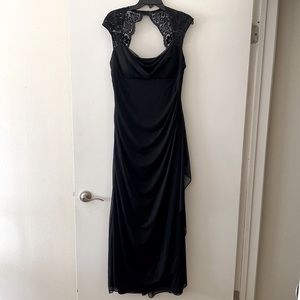 Stunning black  mesh ruched gown with lace shoulder detail by Xscape. Size 14